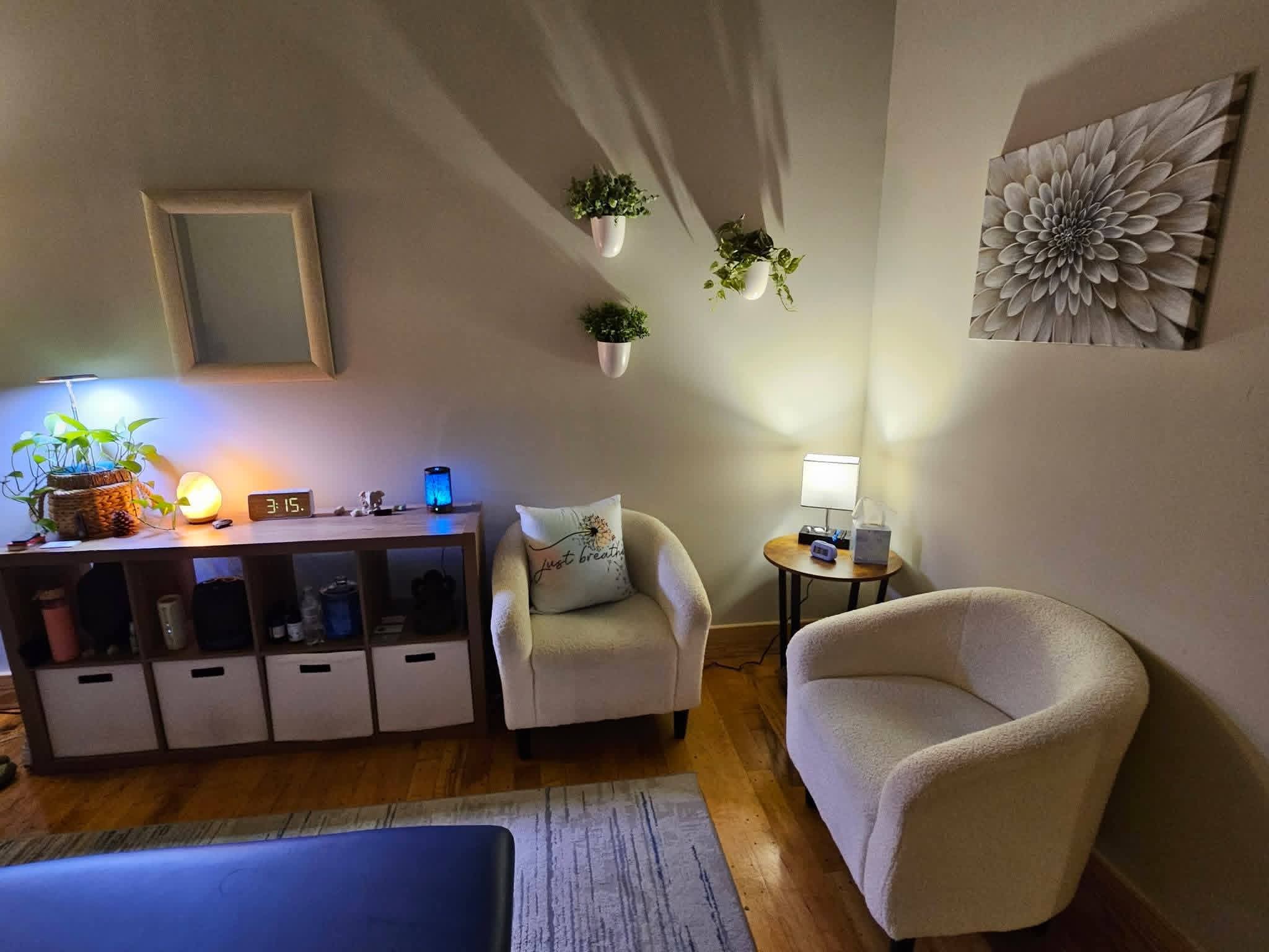 A calming holistic therapy room set up for the Balance the Battle Expo