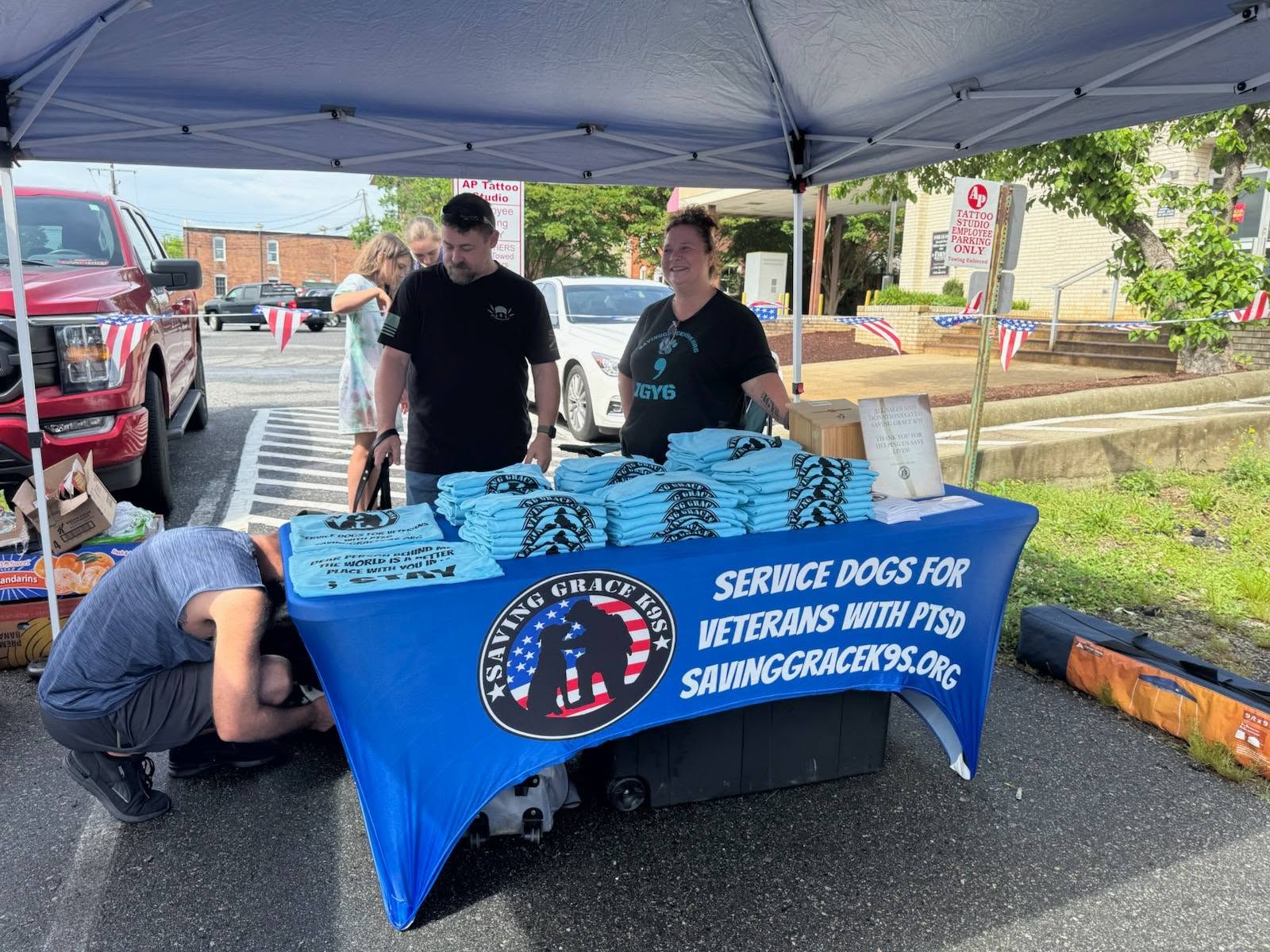 A Service Dogs for Veterans booth at a Let's Talk Strength community event