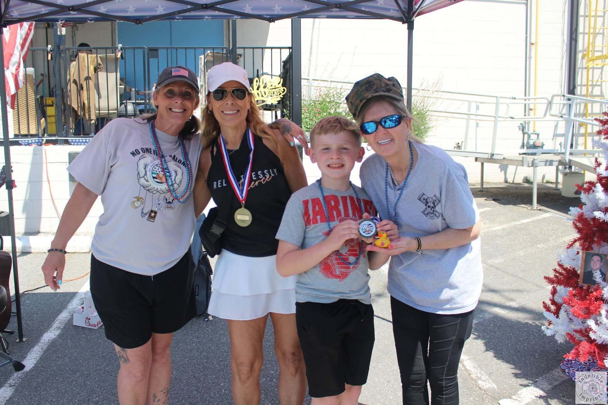 A group posing together with their LTS 5K finisher medals