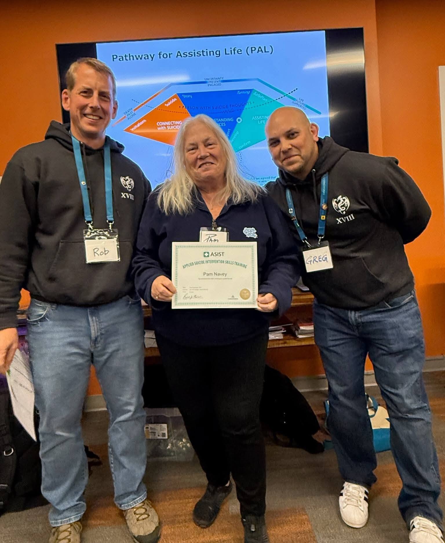A group of Let's Talk Strength training graduates holding their certificates